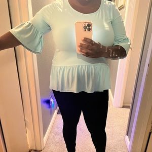 Peplum High-low shirt! Perfect for work or a brunch out with friends!